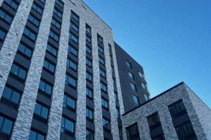 A photo of the top of 475 Bay Street, a 12-story affordable housing development in Staten Island.